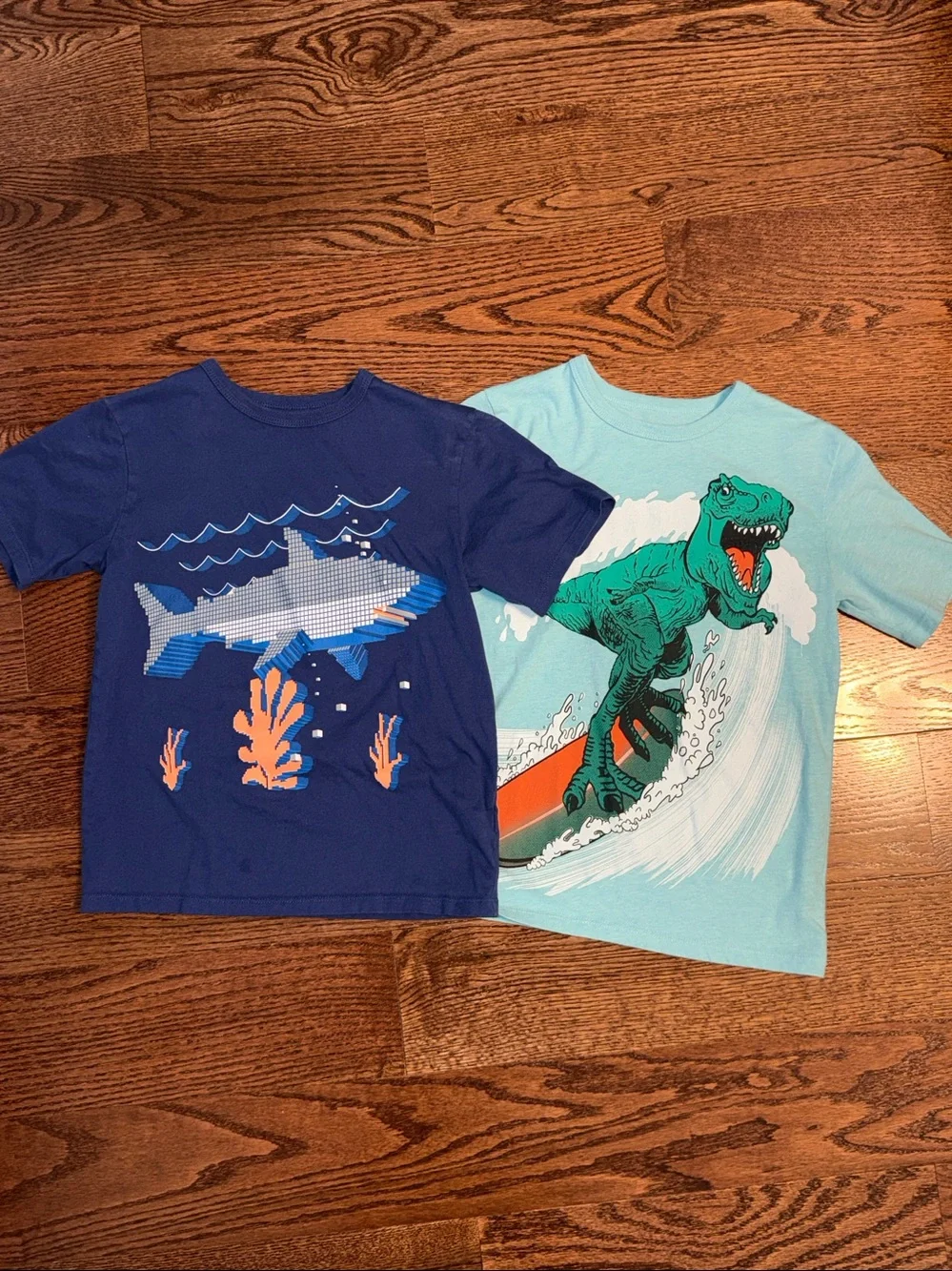 Size M/7-8 boys bundle of 2 short sleeve graphic t-shirts.
